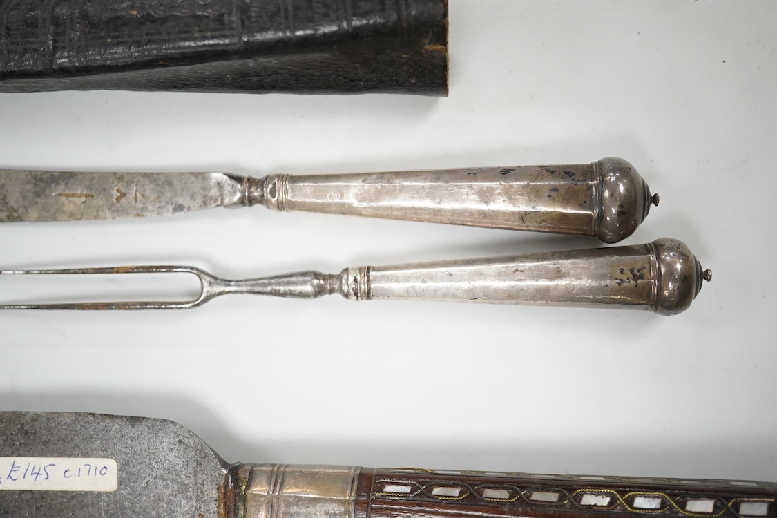 Three 17th / 18th century steel bladed knives, one in a leather sheath with matching fork. Longest 24cm.
